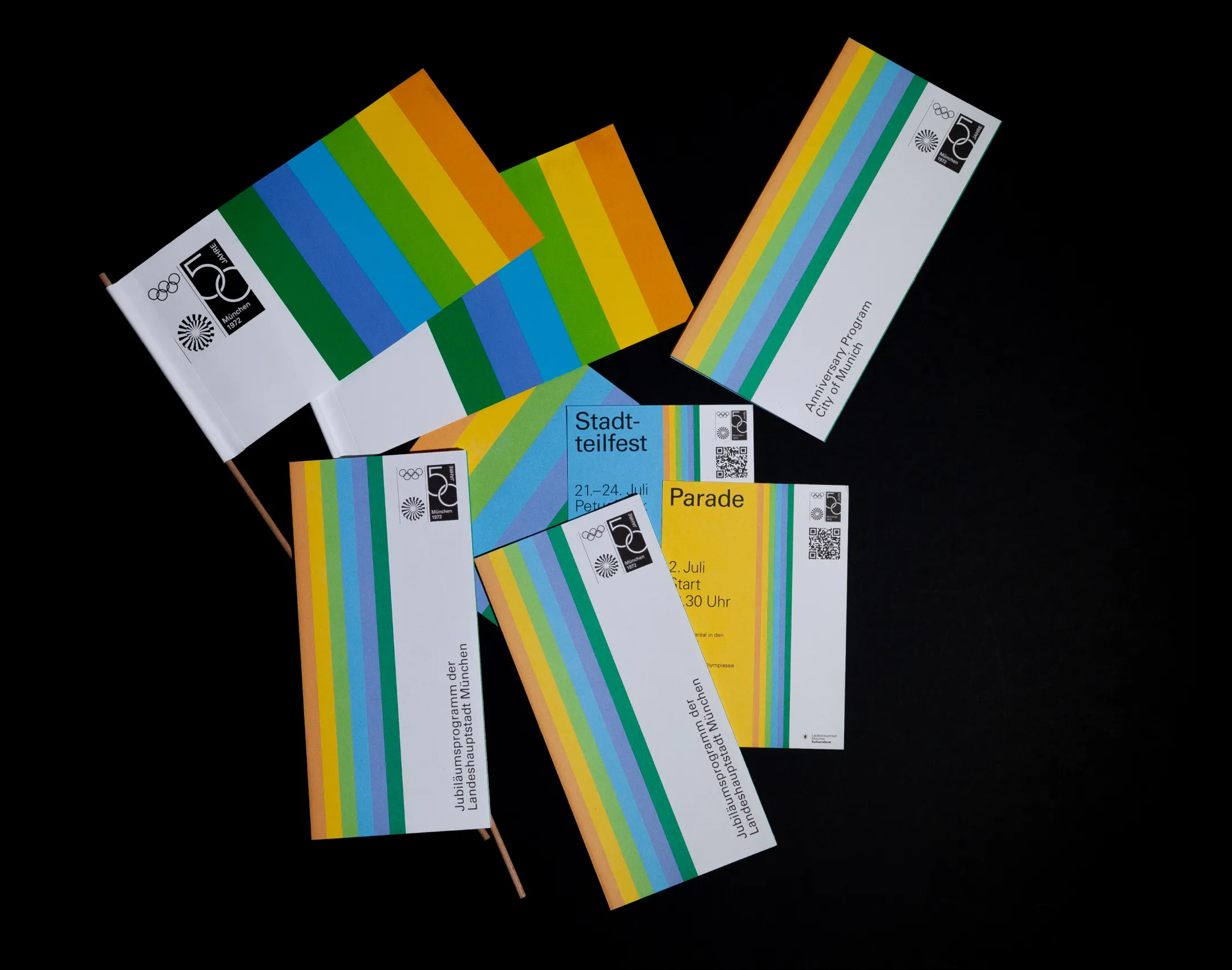 Editorial Design und Merchandising-Set für 50. Jubiläum Olympia München, konsistente Markenführung und Printmedien-Gestaltung